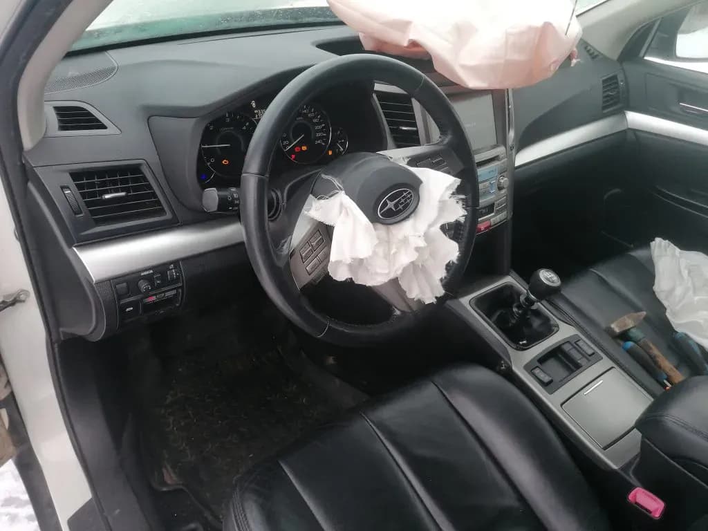 Foto van de gedemonteerde auto 5