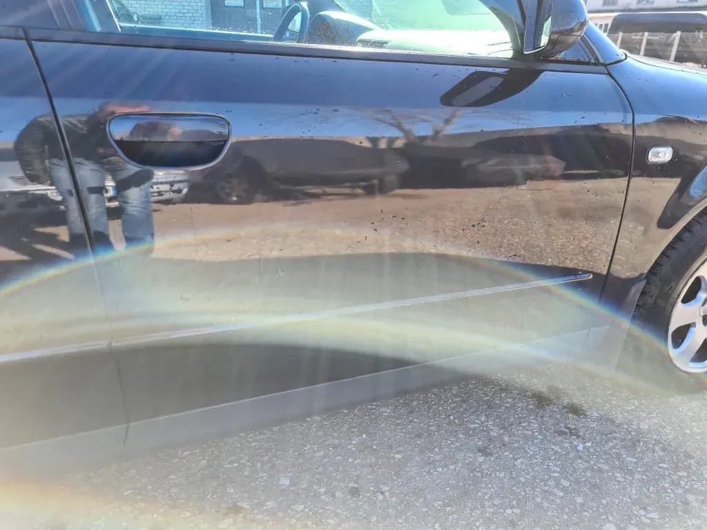 Foto van de gedemonteerde auto 4