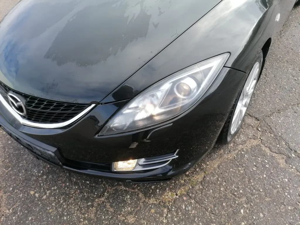 Foto van de gedemonteerde auto 3