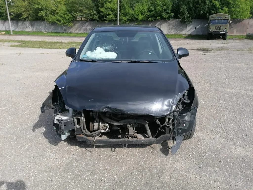 Foto van de gedemonteerde auto 5